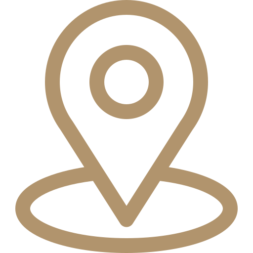 A brown map pin icon with a large circle at the bottom, representing a location marker on a white background.